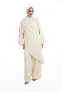 PLEATED FLARE TROUSERS | BUTTERMILK